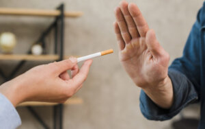 man refusing cigarettes offered by his female 670x420 1 300x188 - أسرار التخلص من الكحة نهائياً